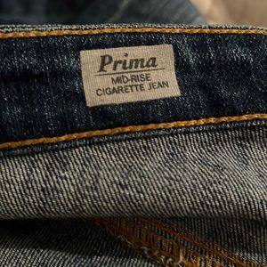 Used loved with no flaws. AG Prima